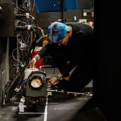 Production Arts student working on electrics